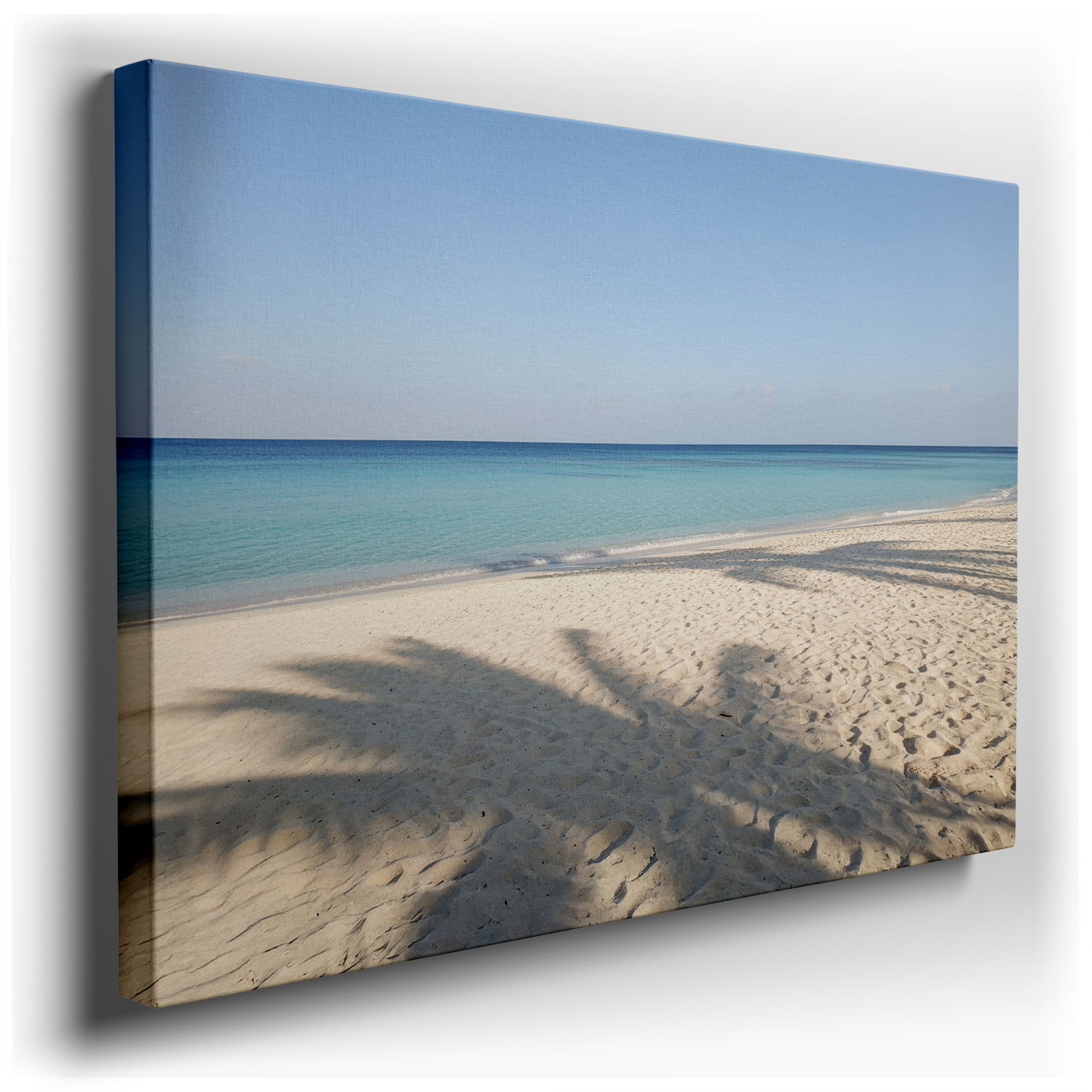 A serene beach scene with turquoise water and white sand, perfect as Wrapped Canvas wall art for a tranquil home ambiance.