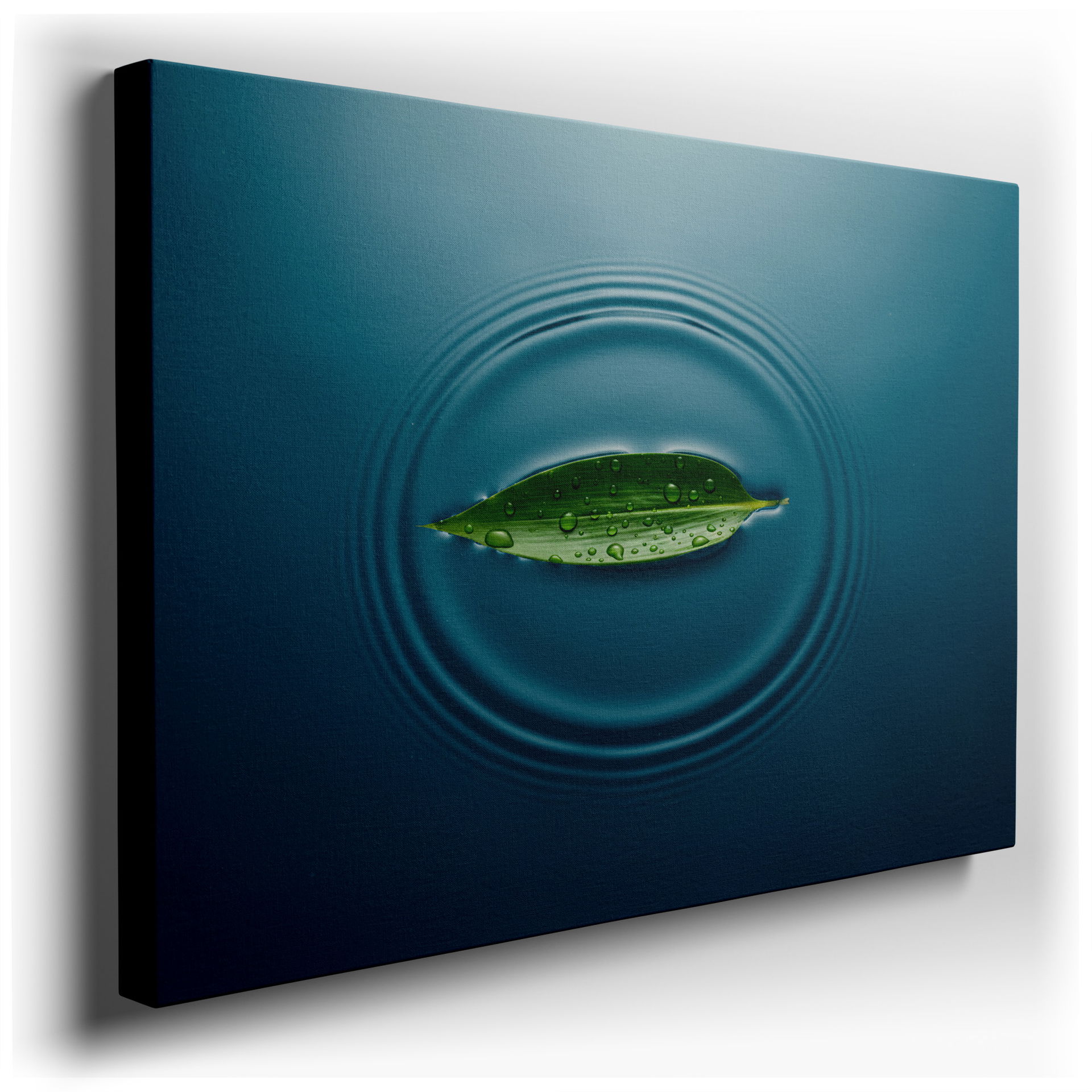 A green leaf with water droplets floats on rippled water in this captivating nature wall art.