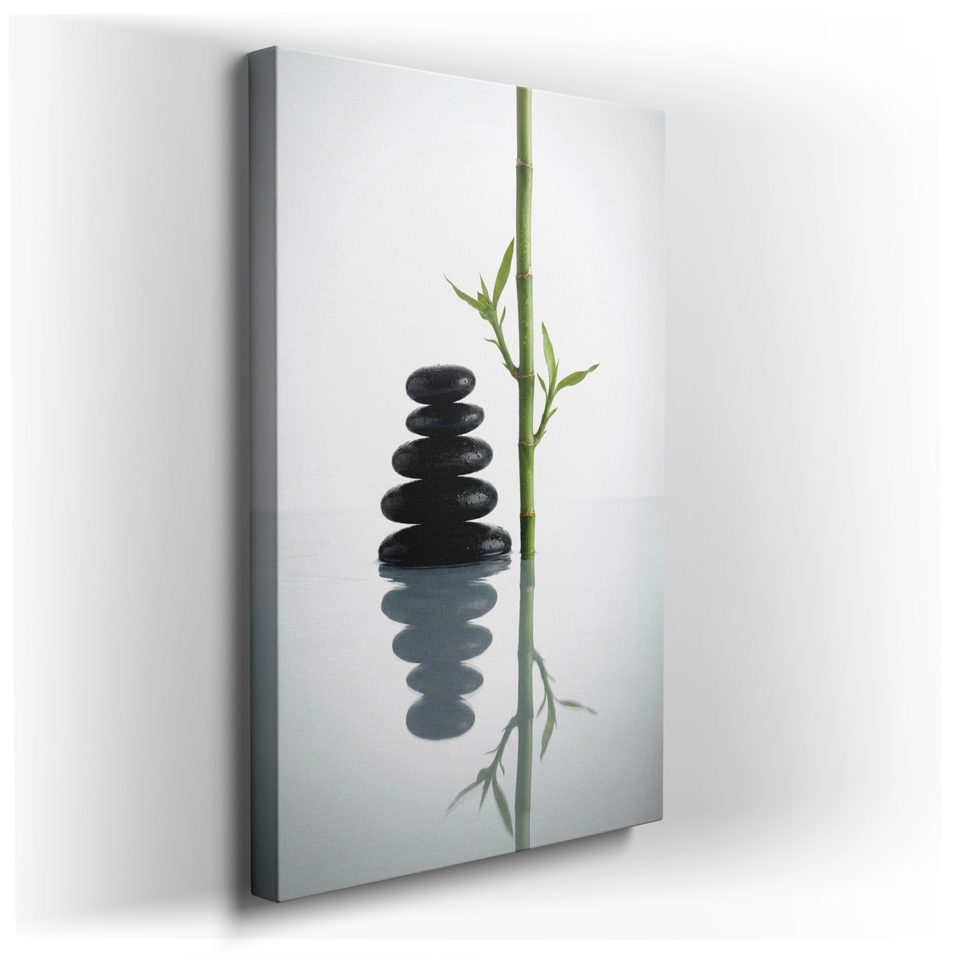Tranquil stacked stones and bamboo stalks create a Zen wall art scene, perfect for serene home decor.
