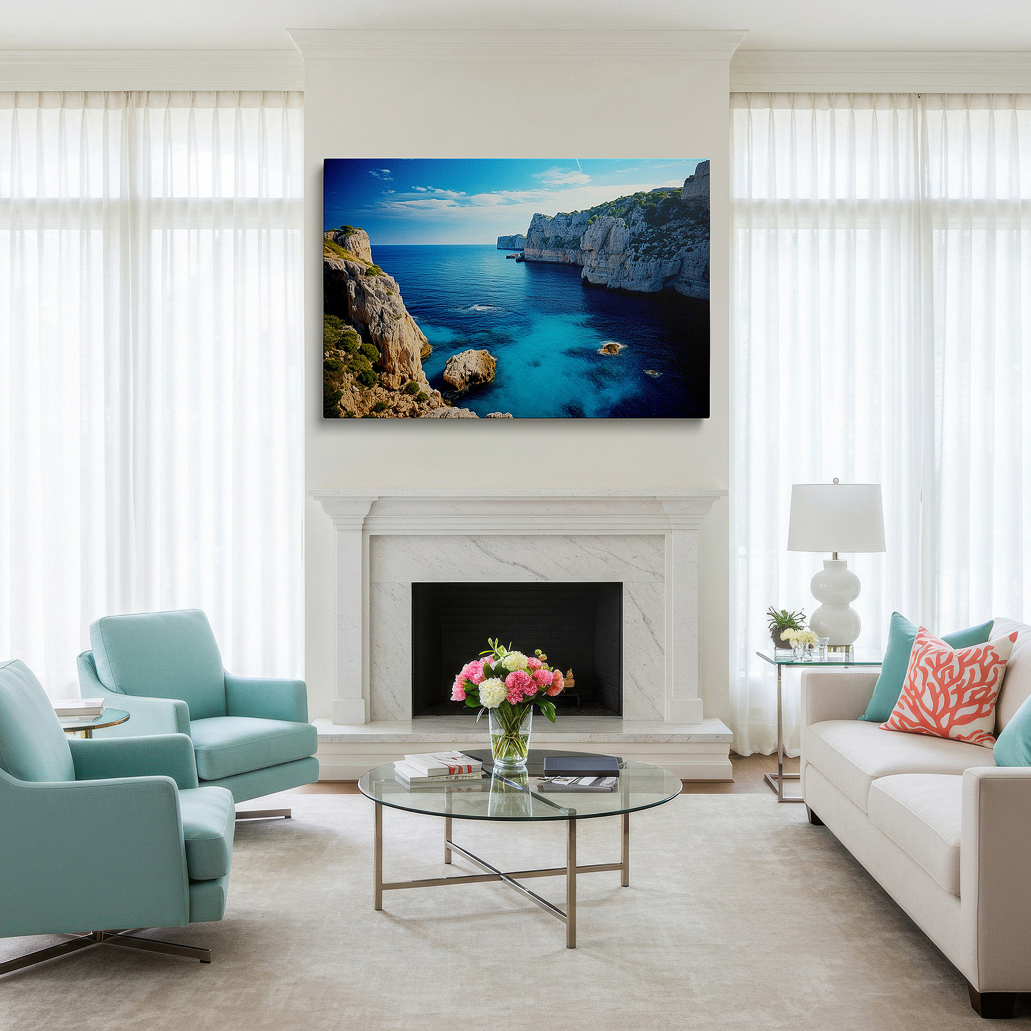 Displayed above a contemporary leather sofa in warm light — serene coastal scene with vibrant blue sky and turquoise waters against rugged cliffs, large canvas wall art for home and office decor