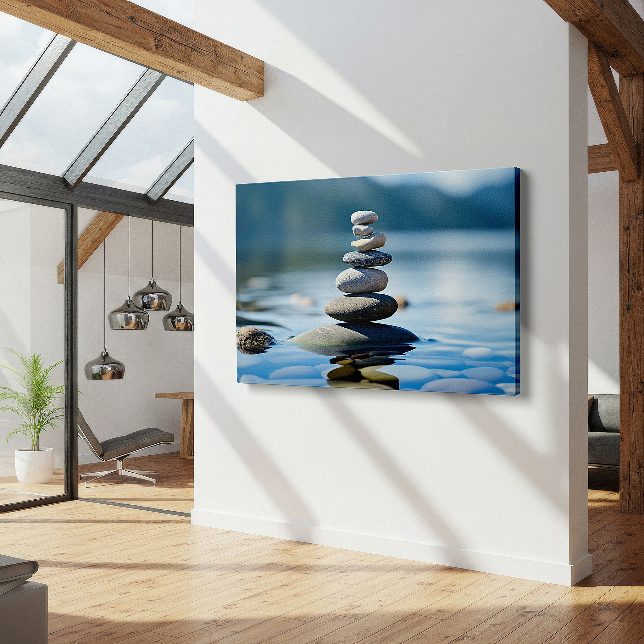 Displayed above a contemporary leather sofa in warm light — serenity in balance - stones balanced on peaceful waters mirroring sky and spirit, large wall art, canvas wall art, wall decor for office and bedroom