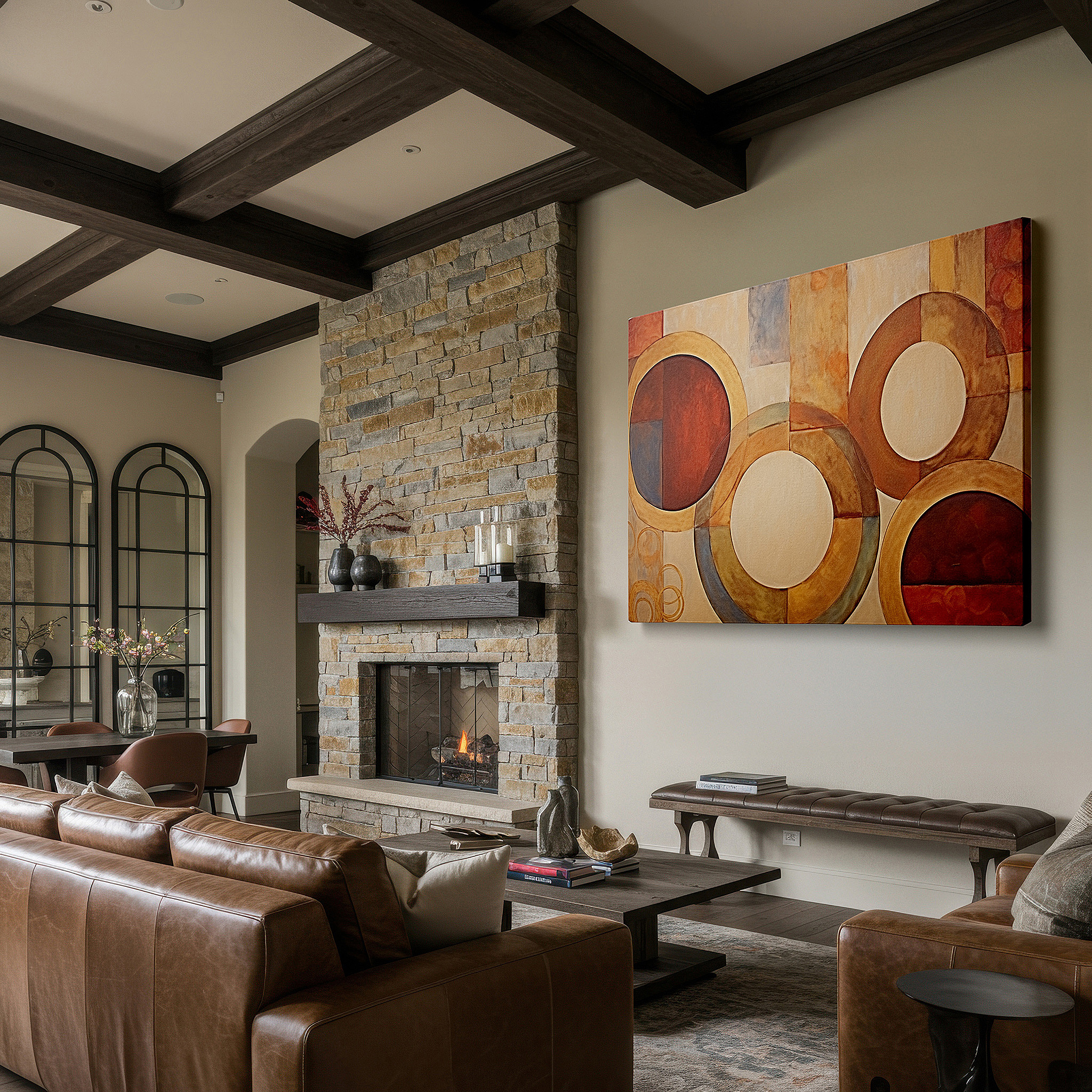 Gently illuminated by ambient lighting in an entryway — warm earthy tones interlocking circles symbolizing unity and continuity, large canvas wall art for office decor