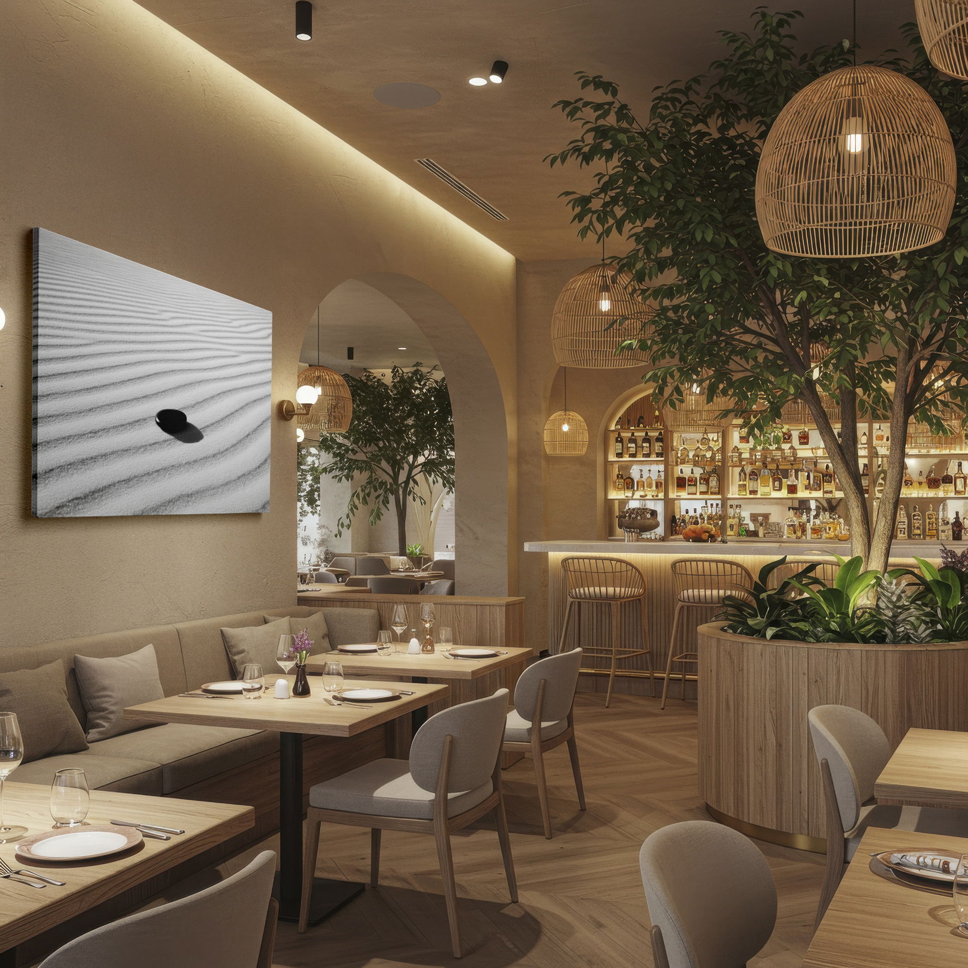 Minimalist wall decor showing a dark stone resting on raked white sand, shadows adding depth.