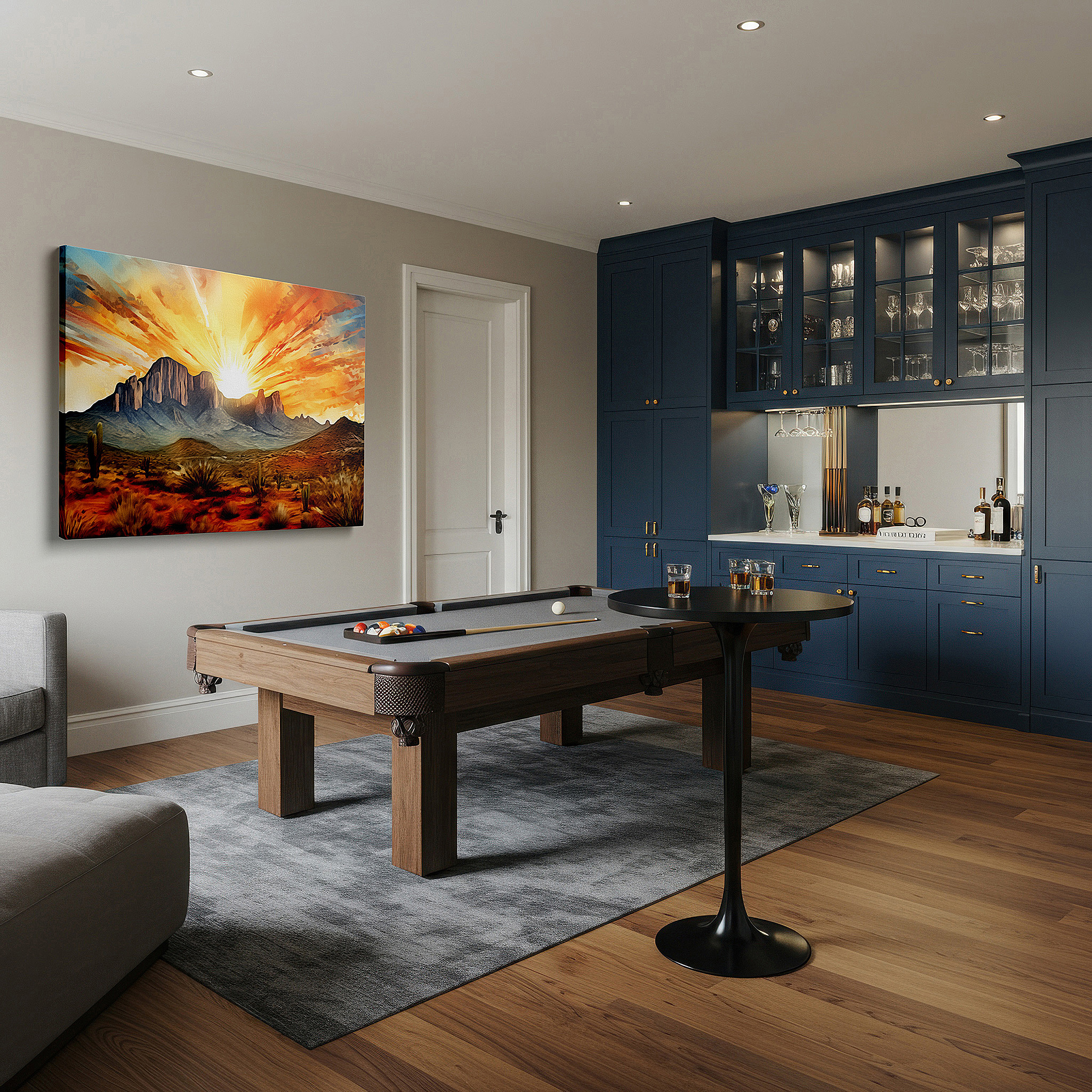 Displayed above a contemporary leather sofa in warm light — majestic mountains silhouetted against a vibrant sunset sky - large canvas wall art for office and bedroom decor