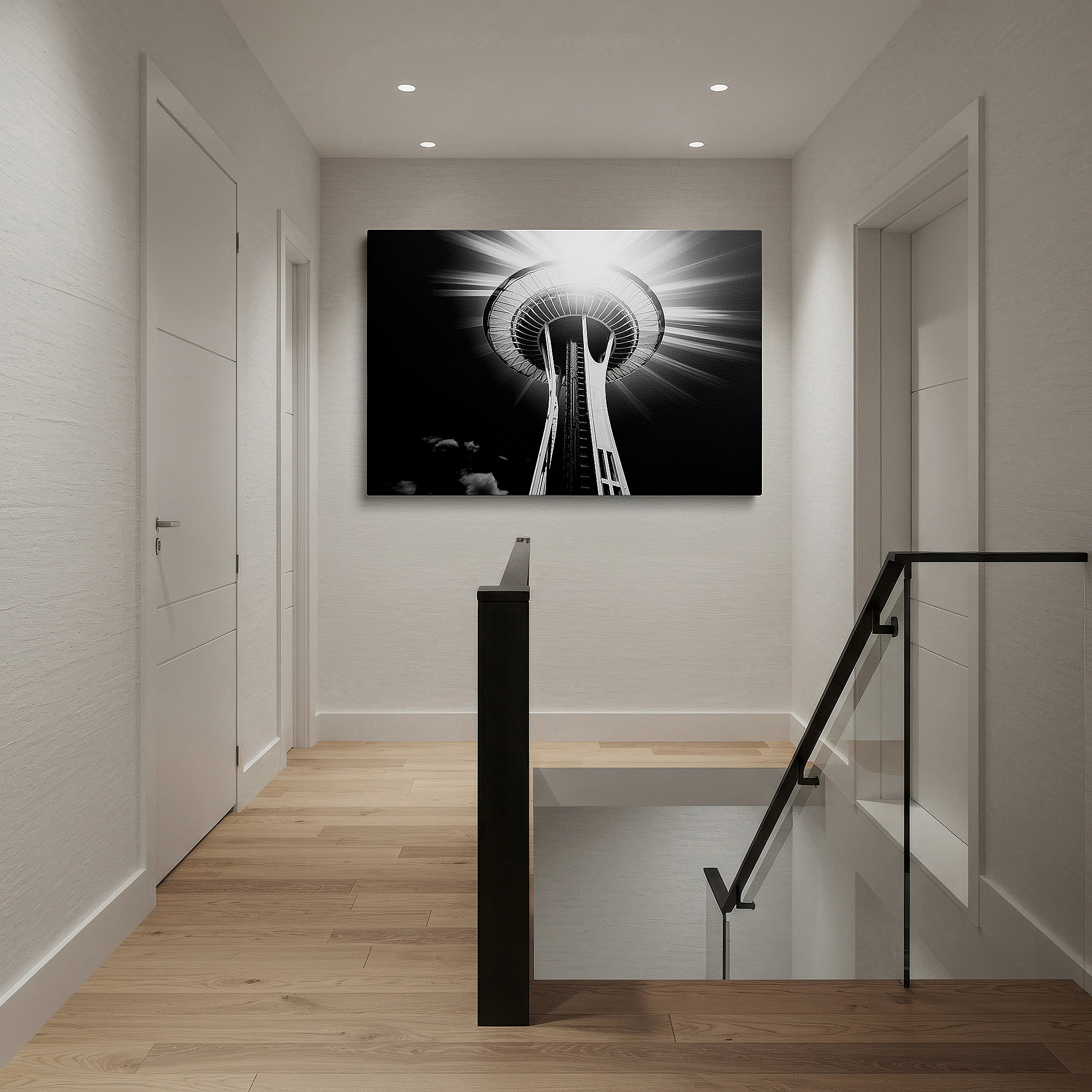 Hung in a cozy reading nook beside a floor lamp and bookshelf — seattle space needle in dramatic black and white: a masterful interplay of light and shadow, large canvas wall art for office decor