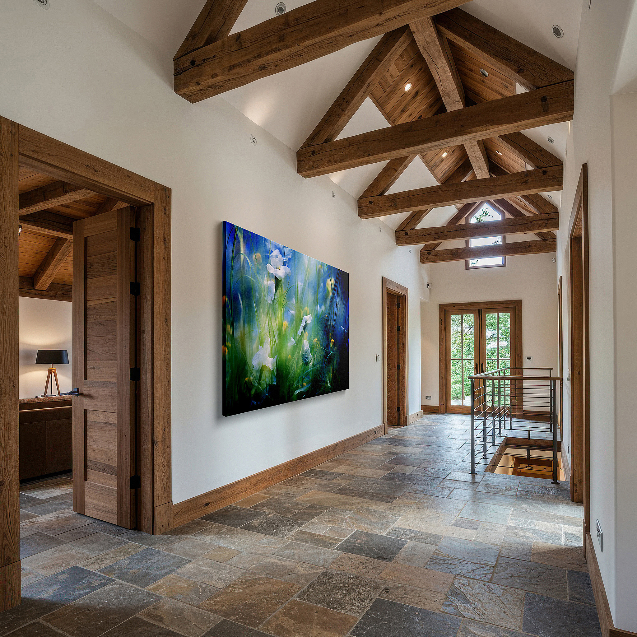 Mounted in a loft-style interior with exposed brick walls — serene dawn in a peaceful garden: ethereal white flowers amidst gentle greens and blues, large canvas wall art for home and office decor