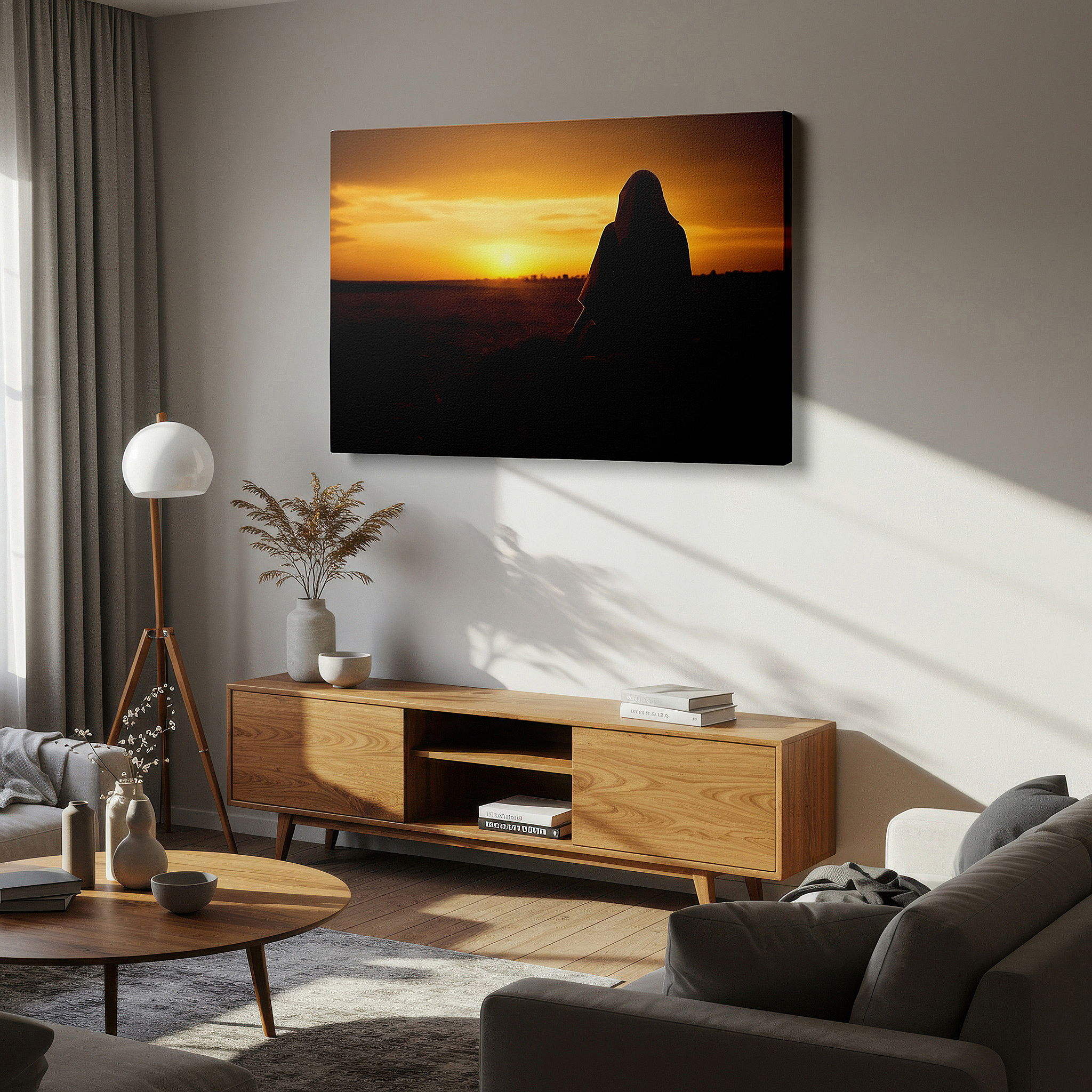 Set in a minimalist interior with textured walls and soft rugs — wall art: "silhouette of serenity" - woman in hijab against sunset landscape, large canvas wall art for office and bedroom decor