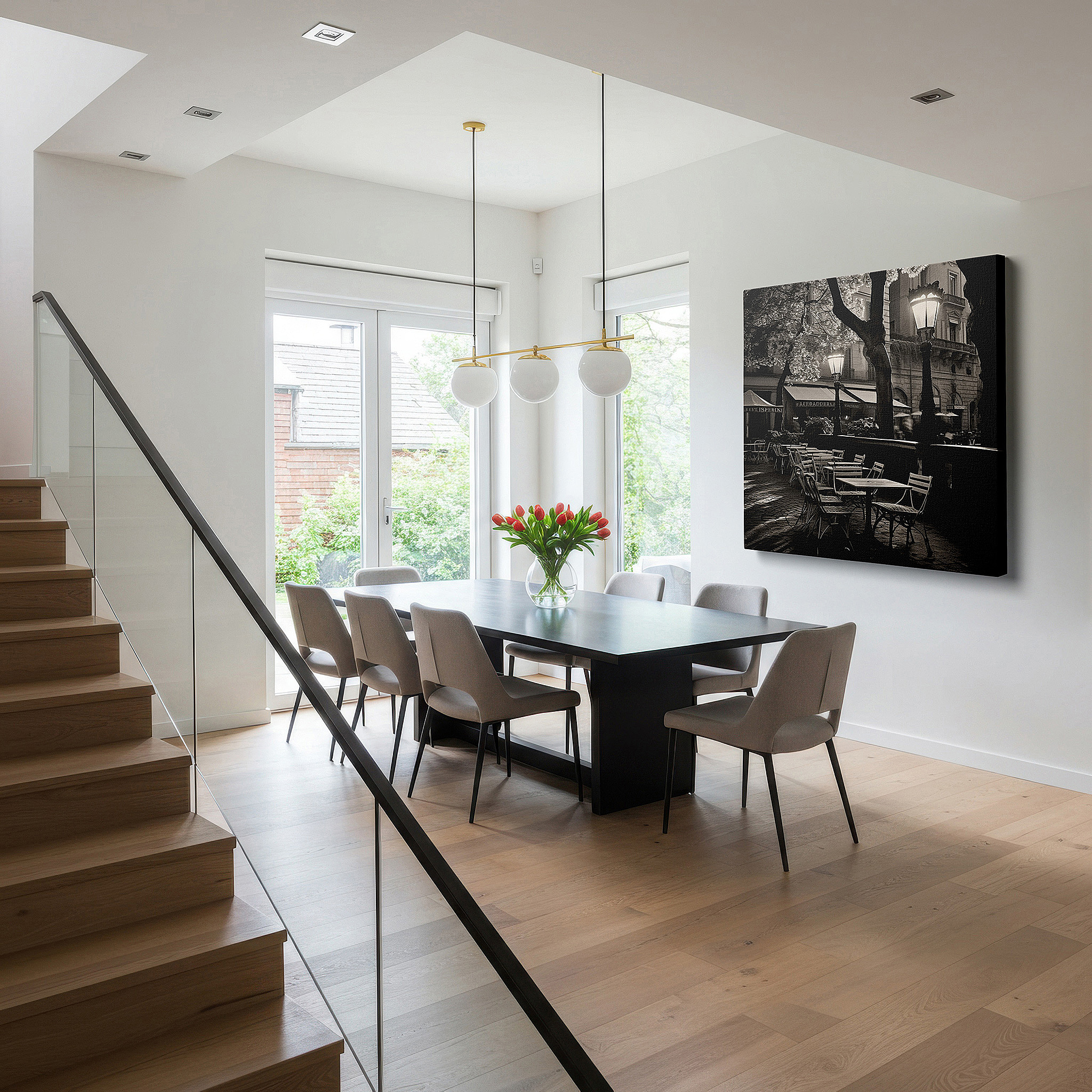 The 75×50 cm version anchors medium rooms without dominating them — black and white café terrace wall art: timeless elegance under majestic trees - large canvas for home and office decor