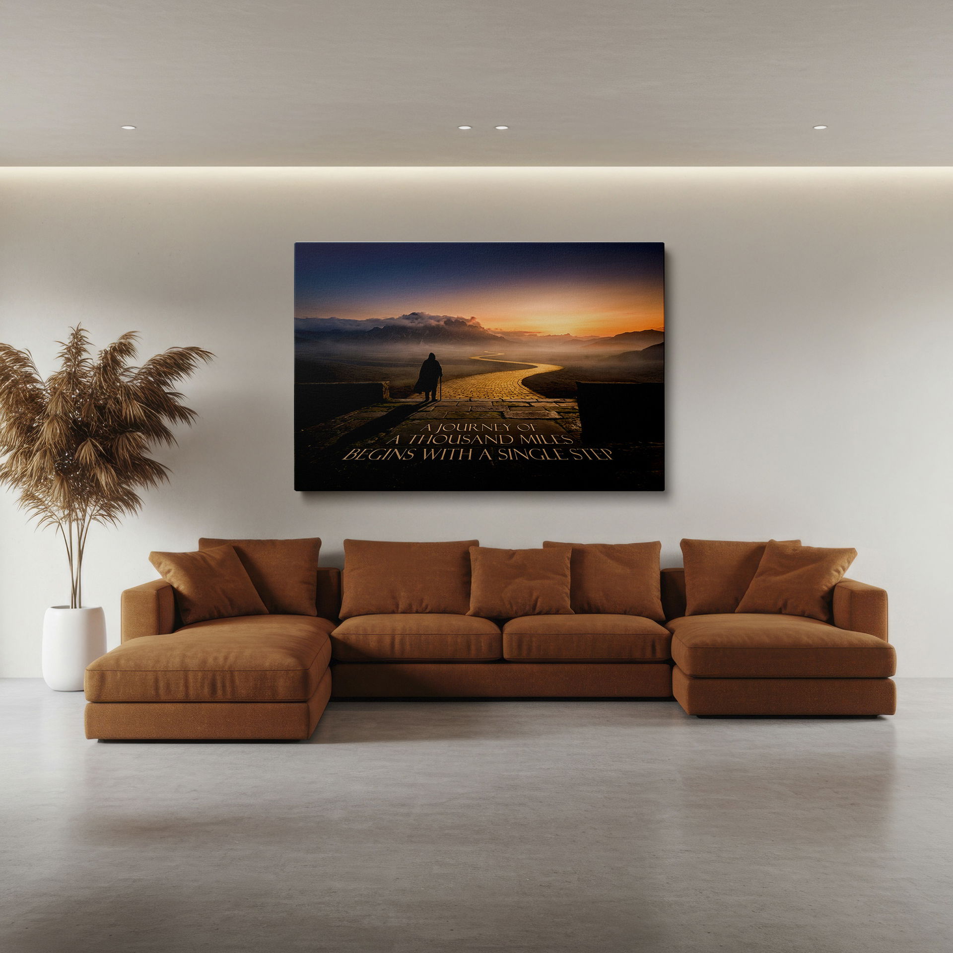 An inspirational wall art print features a figure looking toward a mountain path with a motivational quote.