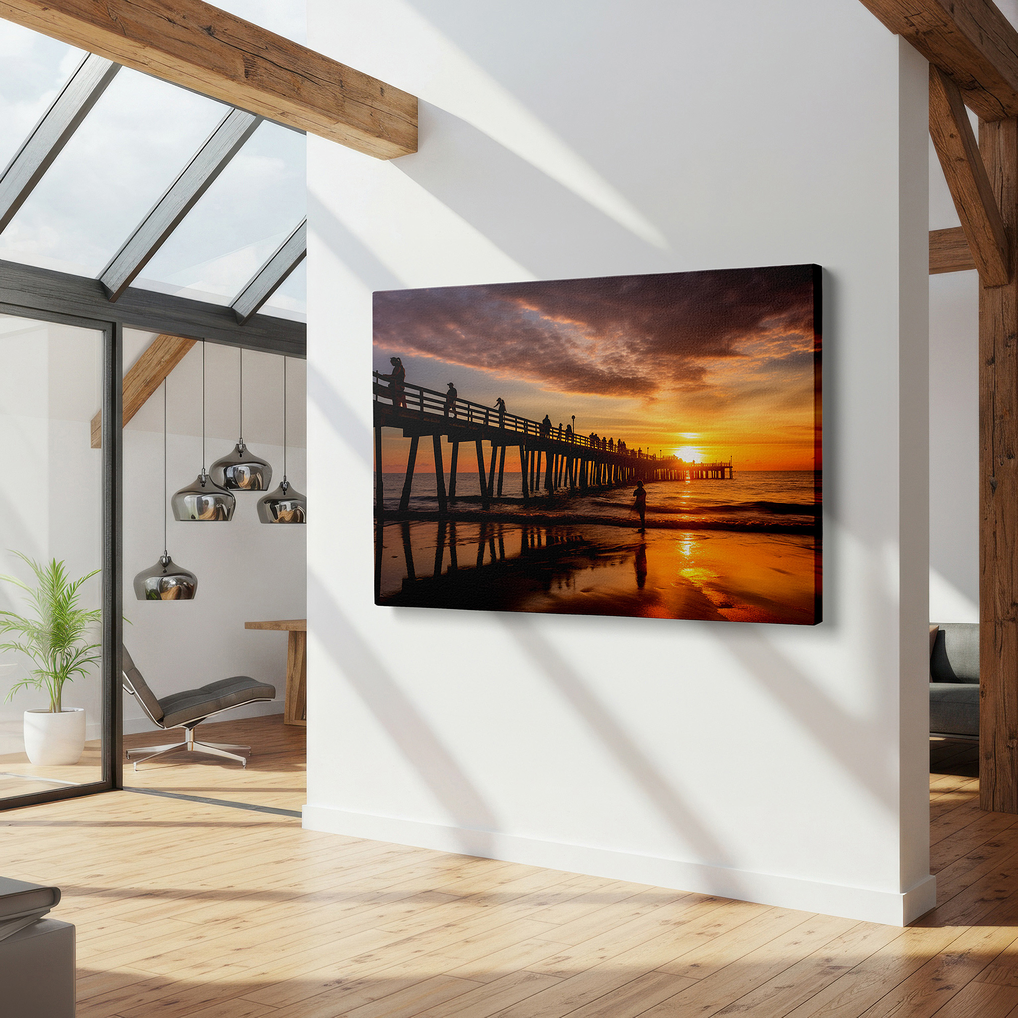 Balanced between two tall indoor plants near a window — ocean pier sunset serenity - tranquil scenery with golden and silvery hues large wall art, canvas wall art, wall decor for office