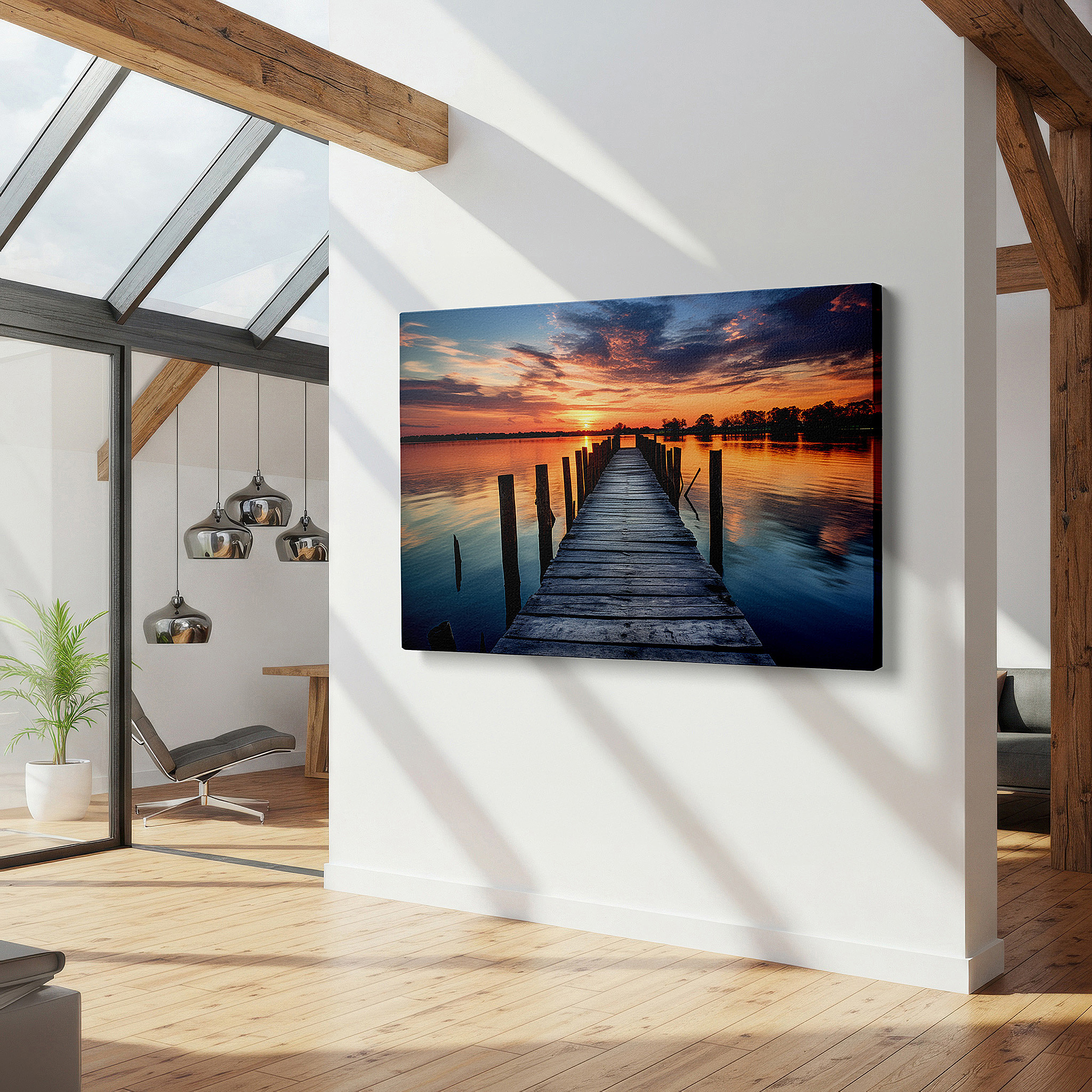 Balanced between two tall indoor plants near a window — tranquil sunset and rustic dock canvas print - serene lake reflection and sky wall art for office and bedroom decor
