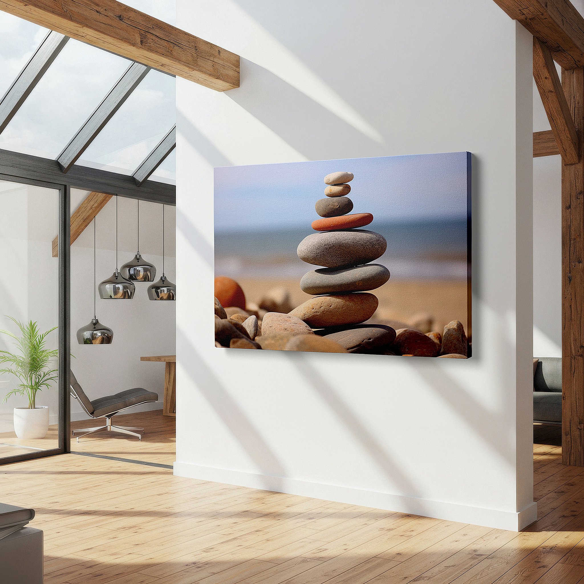 Balanced between two tall indoor plants near a window — wall art: "serenity in balance" - pebbles on a tranquil beach for calm and reflection. large canvas wall art for office and bedroom decor.