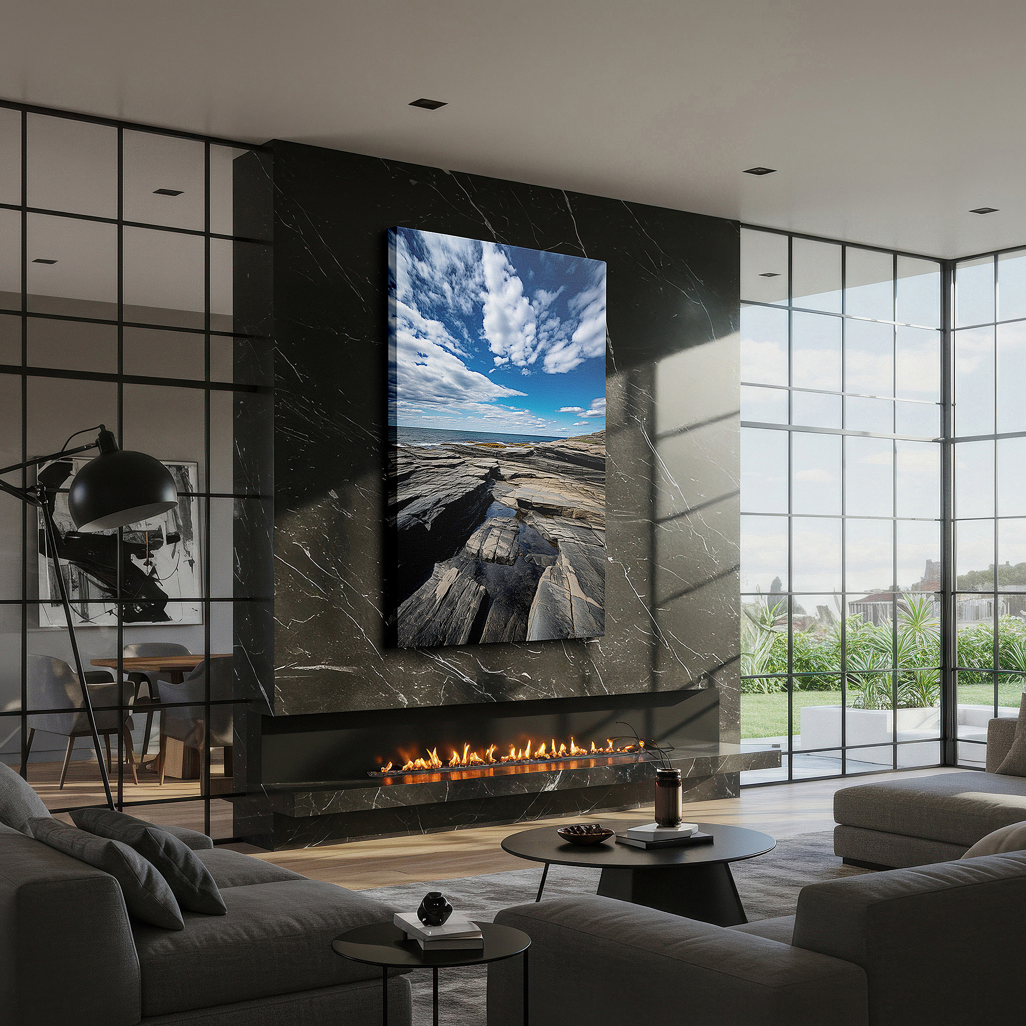 Balanced between two tall indoor plants near a window — wall art: "timeless dance of earth and sky" - panoramic rugged coastline and moody clouds, large canvas wall art for home and office decor