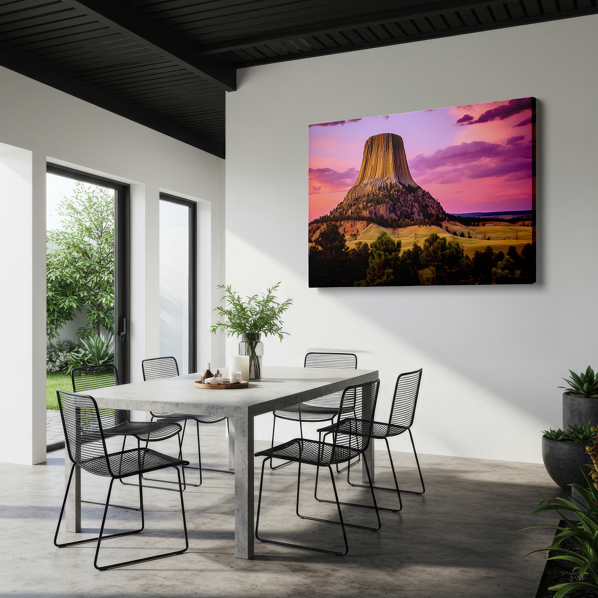 Displayed above a contemporary leather sofa in warm light — devil's tower at sunset: majestic nature's grandeur - large canvas wall art for office and bedroom decor