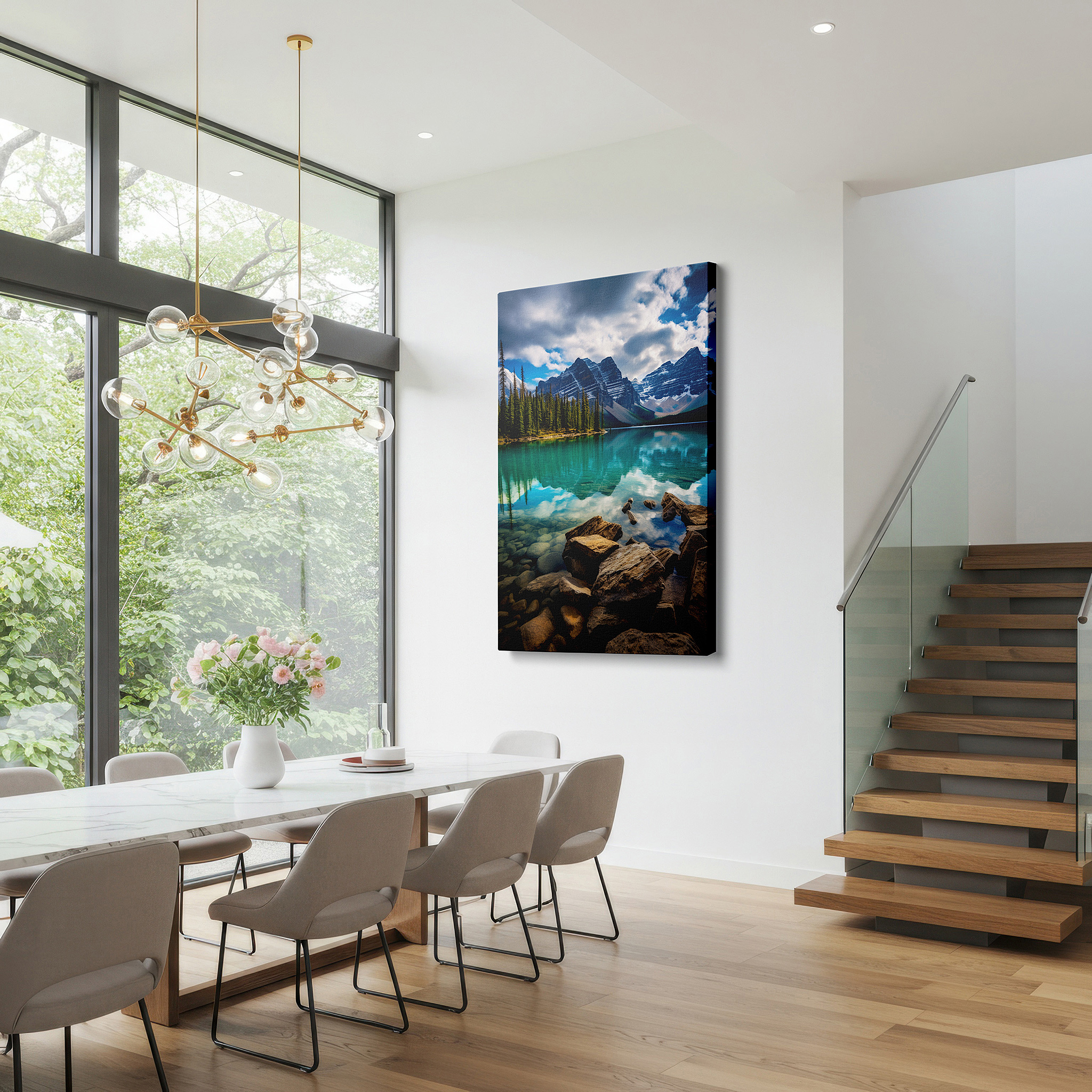 Framed by abstract decor and natural-toned accessories — tranquil mountain lake surrounded by majestic peaks with reflective dynamic skies, large canvas wall art for office and bedroom decor