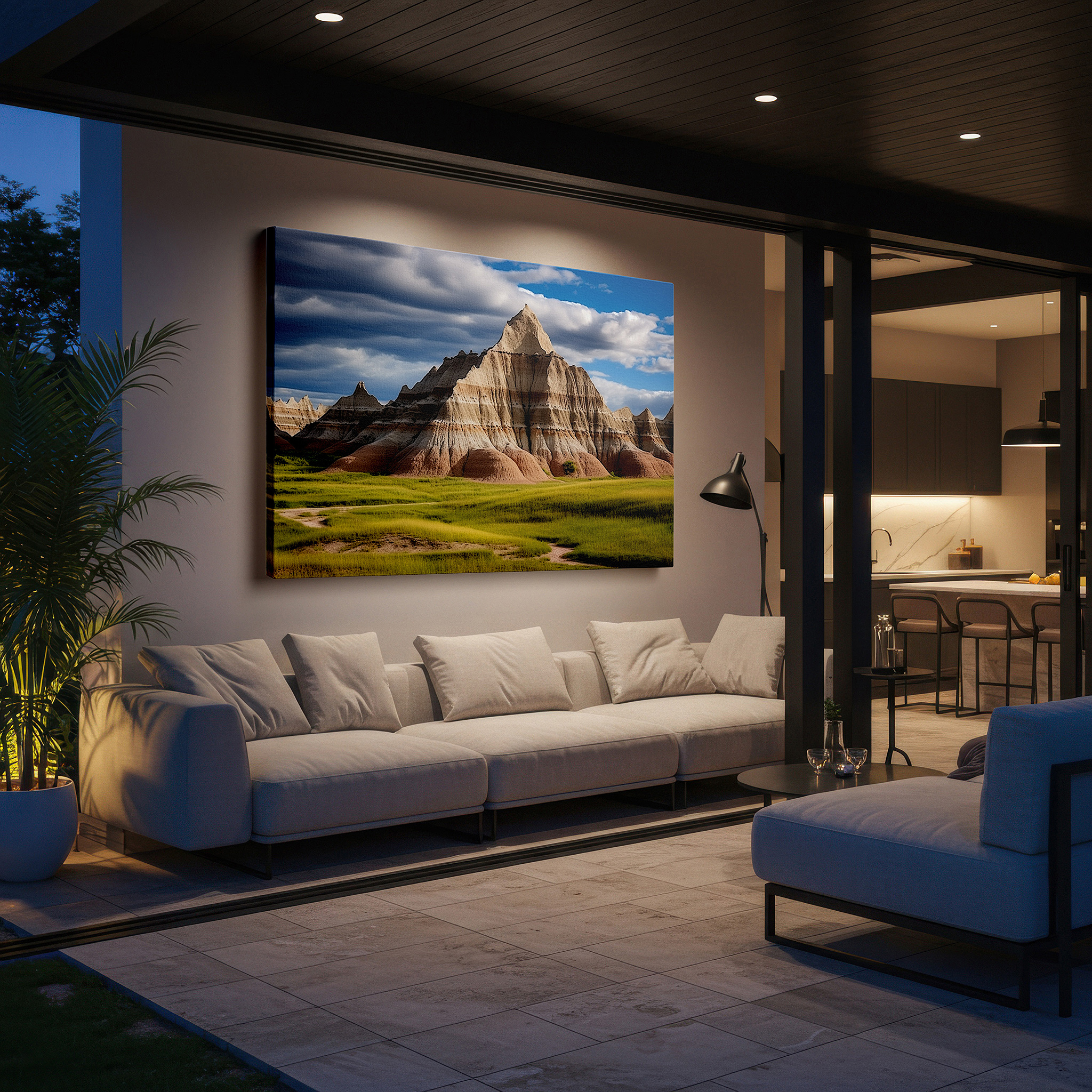 Displayed above a contemporary leather sofa in warm light — stunning badlands panorama featuring vibrant greenery and blue skies - large canvas wall art for office, bedroom, and living room decor