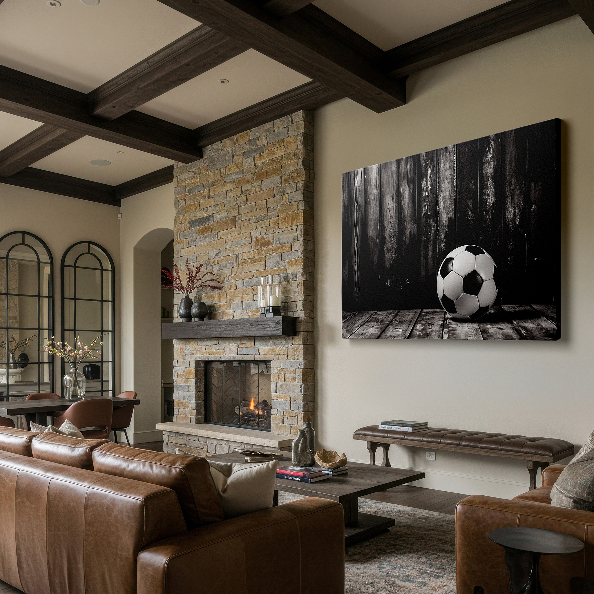Gently illuminated by ambient lighting in an entryway — black and white soccer ball on rustic wooden floor - timeless tribute to the beautiful game, large canvas wall art for office decor