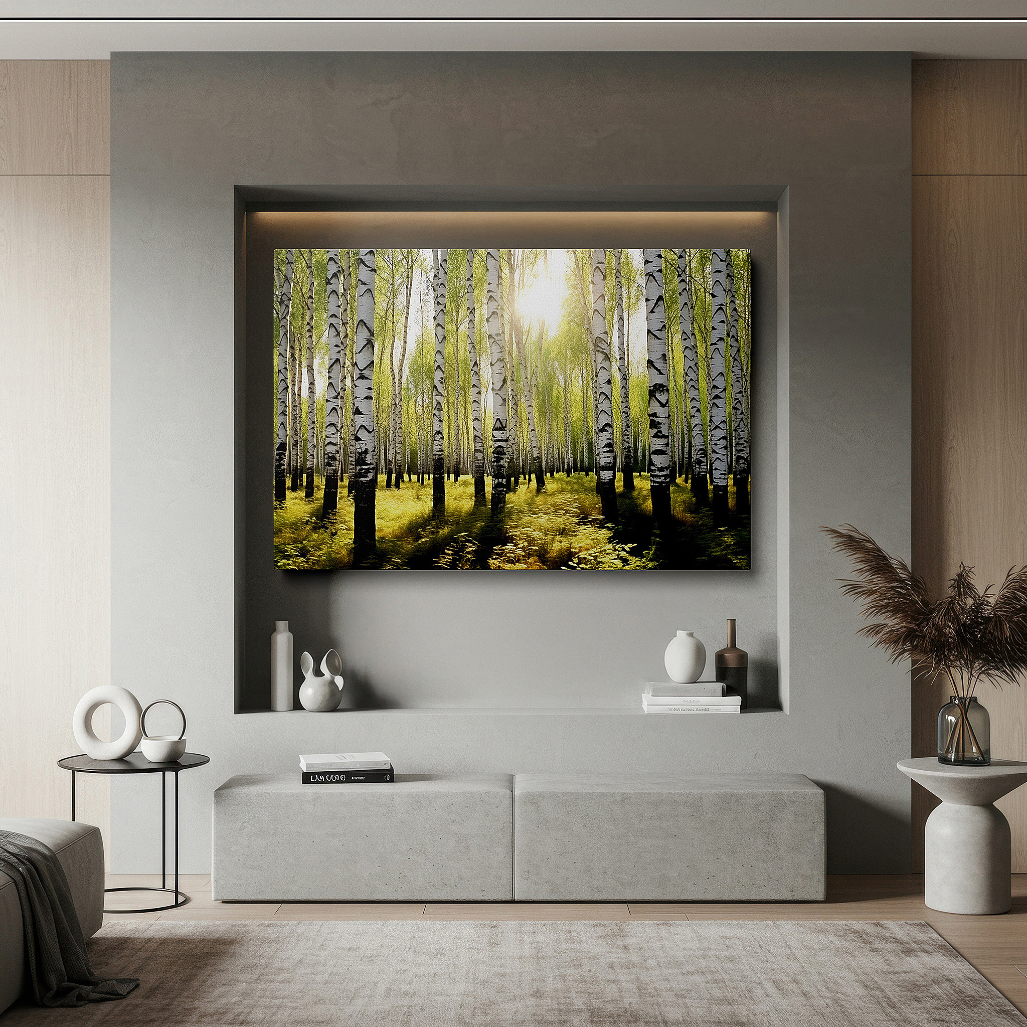 Hung in a cozy reading nook beside a floor lamp and bookshelf — serene birch forest in sunlight: a play of light and shadows, large canvas wall art for home and office decor