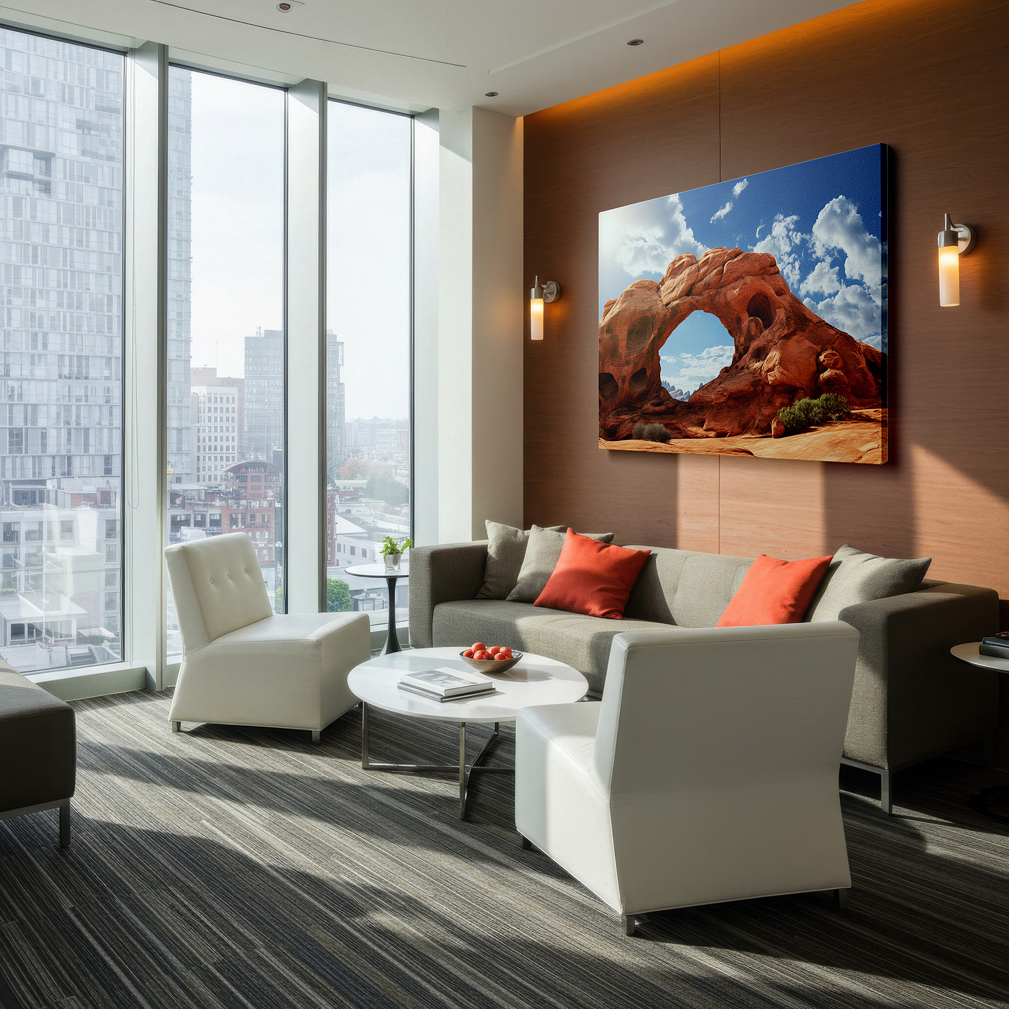 Mounted in a loft-style interior with exposed brick walls — red rock arch majestically framed by a bright blue sky: a tribute to the transformative power of nature - large wall art, canvas wall art, wall decor for office