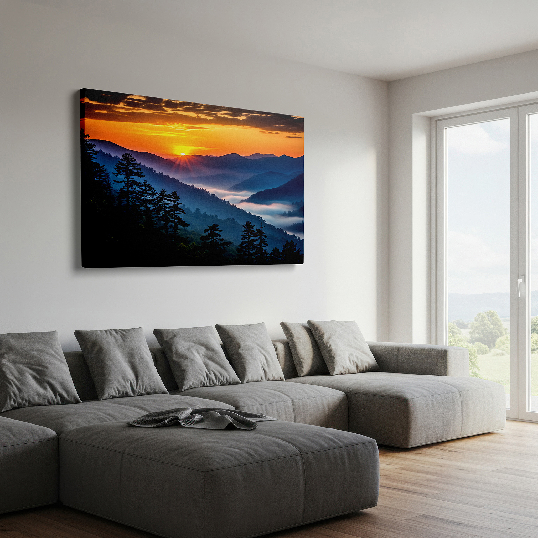 Presented on a clean white gallery wall with ample space — sunrise over misty valley wall art: majestic mountains and silhouetted evergreens - large canvas for office or bedroom decor
