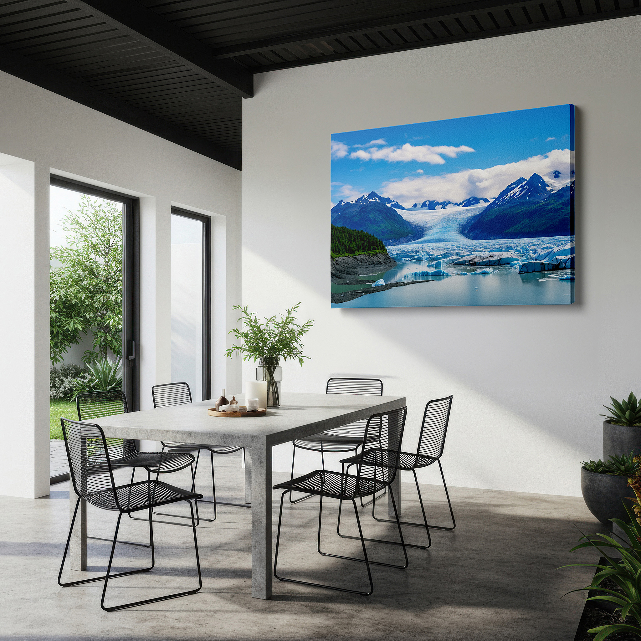 Displayed above a contemporary leather sofa in warm light — majestic mountains and sparkling glacier with serene lake reflections: large canvas wall art for office and bedroom decor