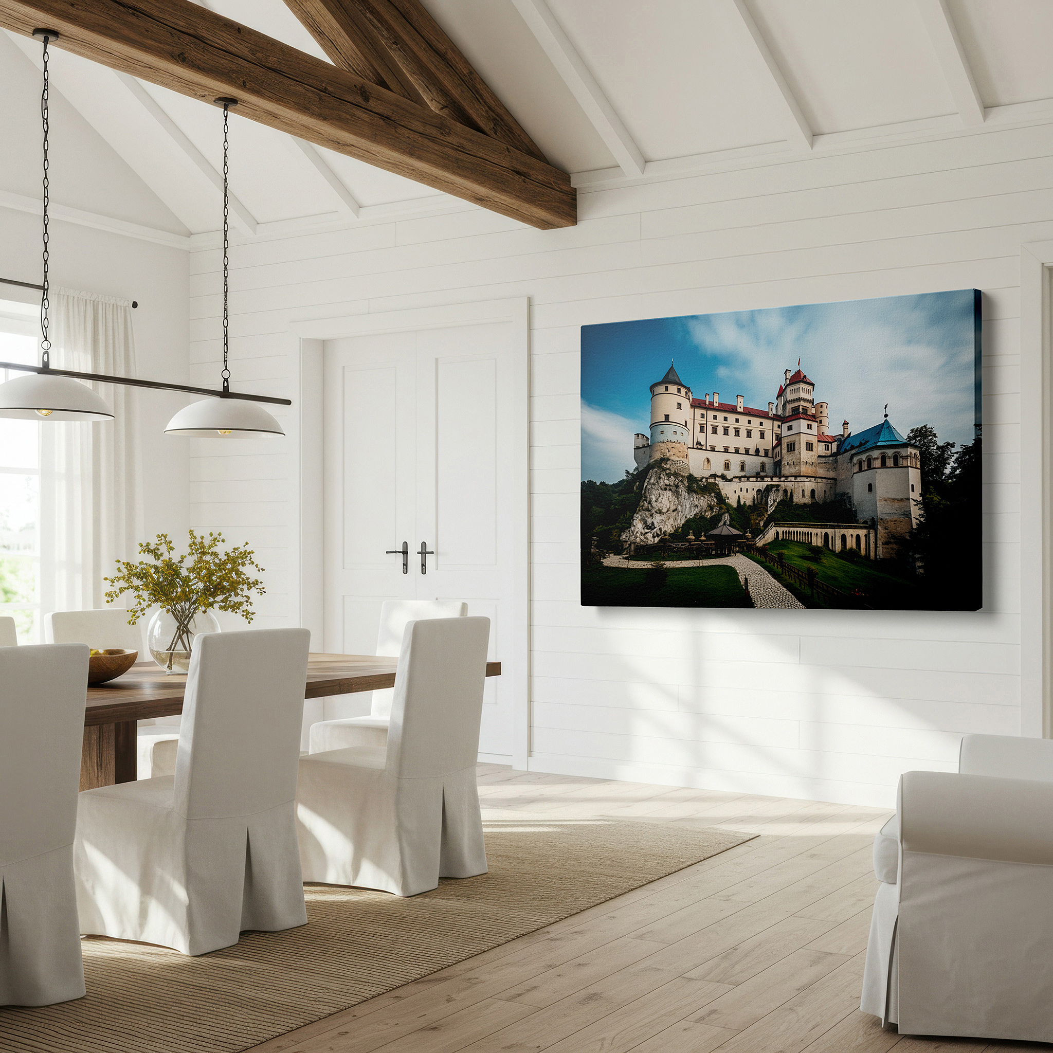 Featured in a dining room with dark wood furniture and candlelight — majestic castle on a cliff surrounded by lush greenery under a bright sky - large canvas wall art for home and office decor