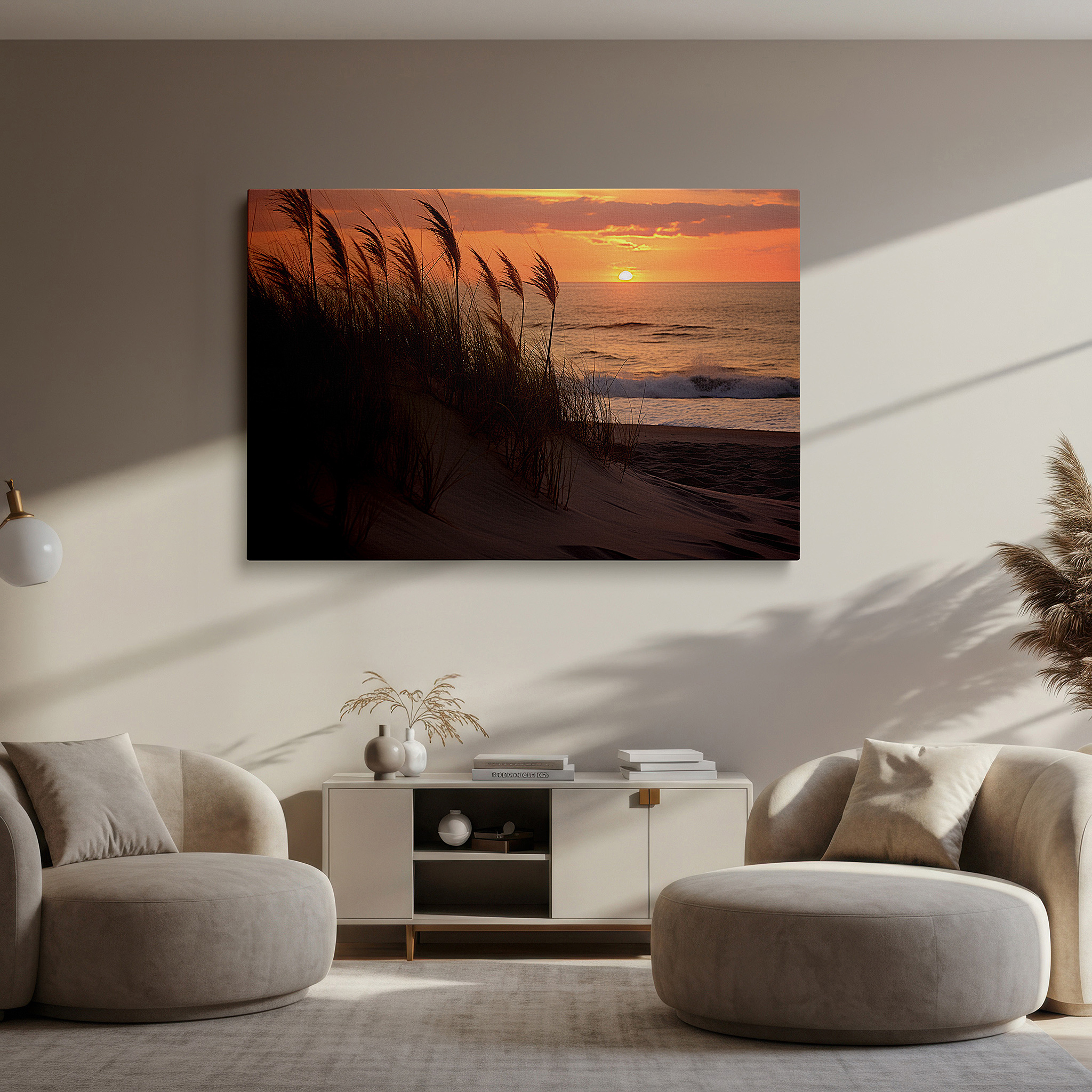 Gently illuminated by ambient lighting in an entryway — golden sunset above sandy dunes featuring swaying grass and calming sea waves - large canvas wall art for office and bedroom decor