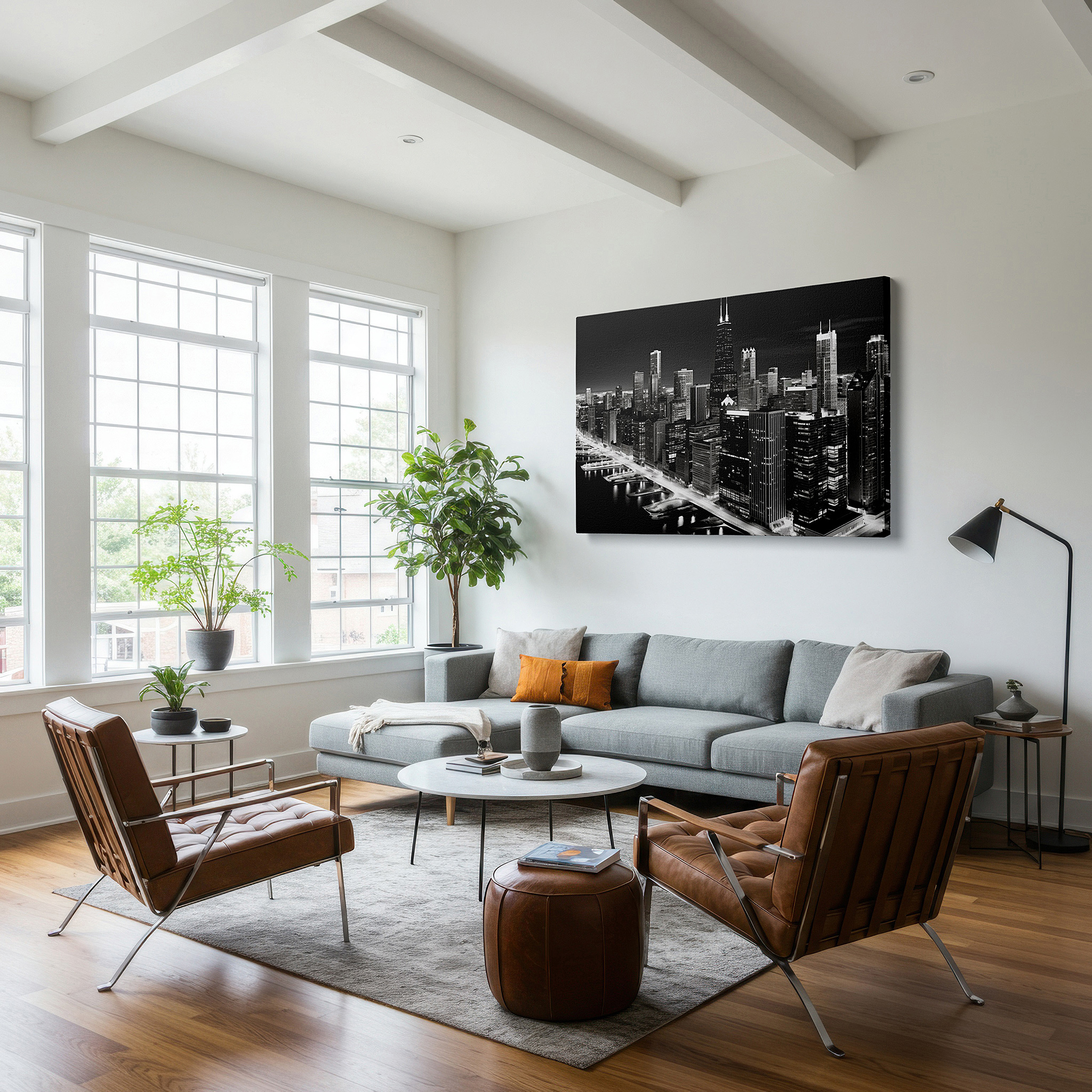 Hung in a cozy reading nook beside a floor lamp and bookshelf — chicago skyline at night in black and white: majestic view with willis tower dominating the skyscrapers - large canvas wall art