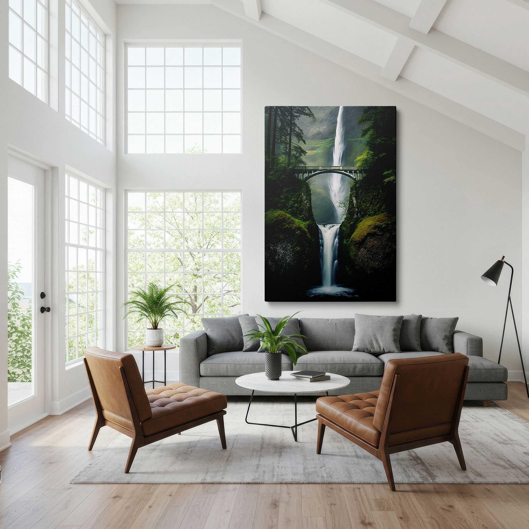 Hung in a cozy reading nook beside a floor lamp and bookshelf — historic bridge and majestic waterfall surrounded by lush greenery: tranquil and adventurous large wall art, canvas wall art, wall decor for office