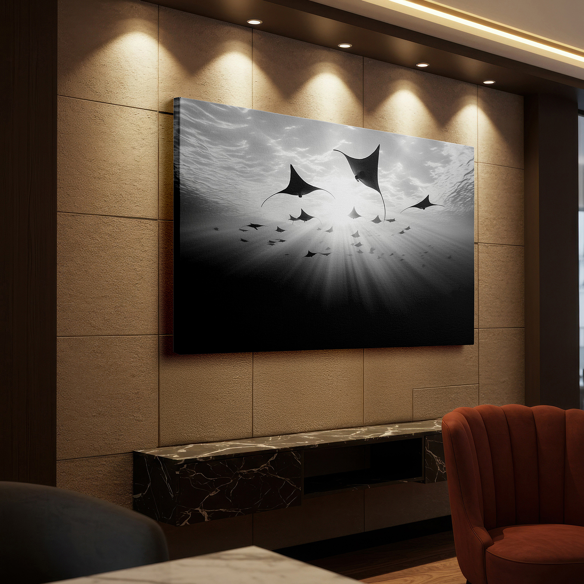 Hung in a cozy reading nook beside a floor lamp and bookshelf — wall decor: elegant manta rays glide through tranquil waters, a dance of light and shadow - large canvas art for office and bedroom