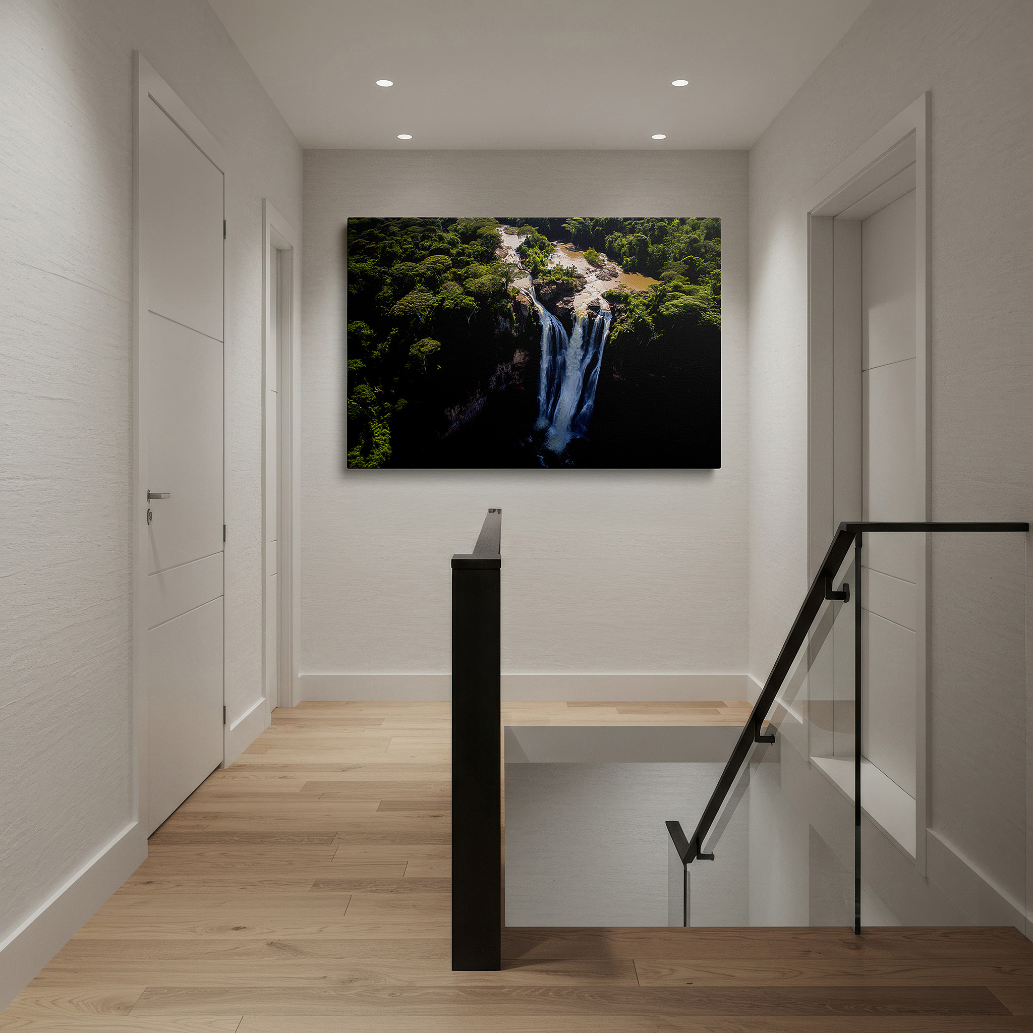 Mounted in a loft-style interior with exposed brick walls — aerial view of majestic waterfall in lush rainforest, large canvas wall art for office and bedroom decor