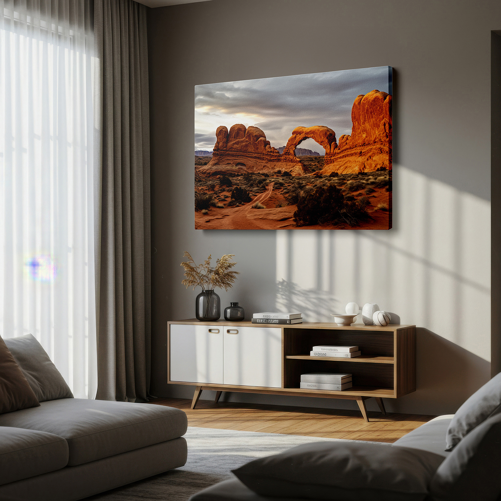 Mounted in a loft-style interior with exposed brick walls — wall art: majestic arches national park - timeless nature and dramatic skies. large canvas wall art for office and bedroom decor.