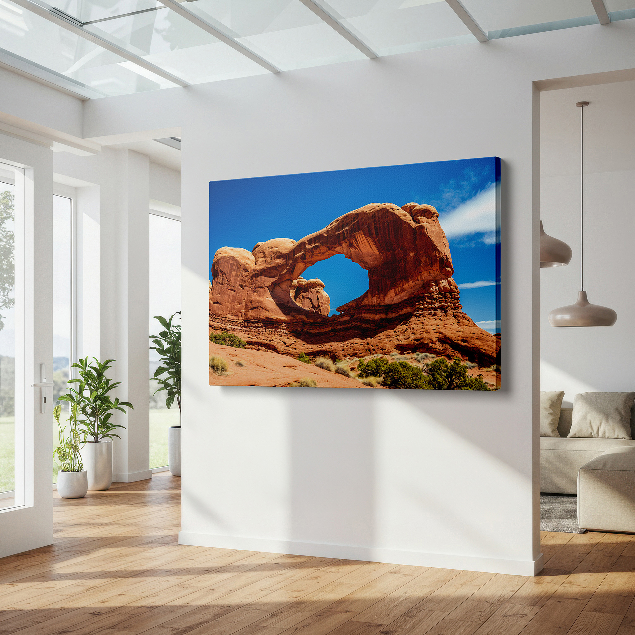 Set in a minimalist interior with textured walls and soft rugs — wall decor: majestic arches national park - gateway to timeless natural beauty and adventure. large canvas wall art for home and office decor.