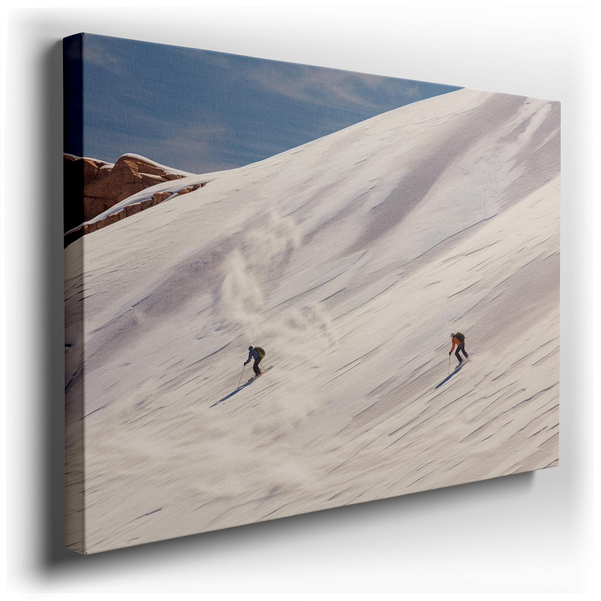 Skiers Gliding on Snow - Covered Slopes Beneath a Bright Blue Sky, a Vibrant Tribute to Winter Sports and the Splendor