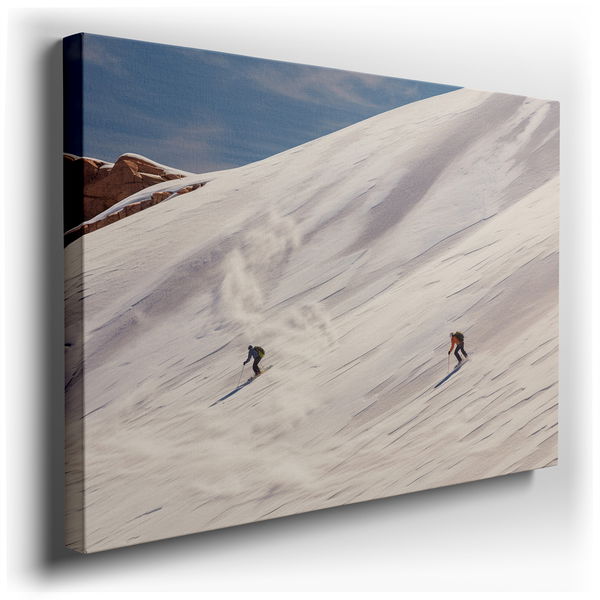 Skiers Gliding on Snow-Covered Slopes - Winter Sports Canvas Wall Art
